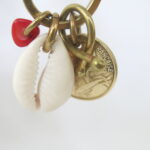 'lucky charm' - Kette mit verschiedenen Messing Anhängern - handmade in Ibiza – Bild 3