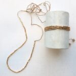 Kette aus 'cut beads' in Gold, Peach und Silber