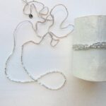 Kette aus 'cut beads' in Gold, Peach und Silber – Bild 9