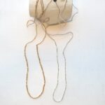 Kette aus 'cut beads' in Gold, Peach und Silber – Bild 10